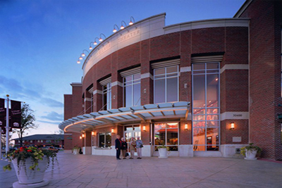 The Village Theater of Cherry Hill, shown here at dusk, is one of the many reasons we love living in Canton in the spring. Many exciting shows are featured in April, May, and June.