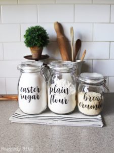 Use clear containers to organize items in your kitchen pantry.