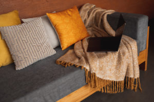Autumn-themed throw pillows can enhance your home decor.