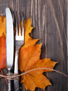 Hosting brunch? Use simple leaves and twine for a splash of color behind your silverware, as shown in this picture. Doing so will help enhance your Autumn home decor at mealtime.